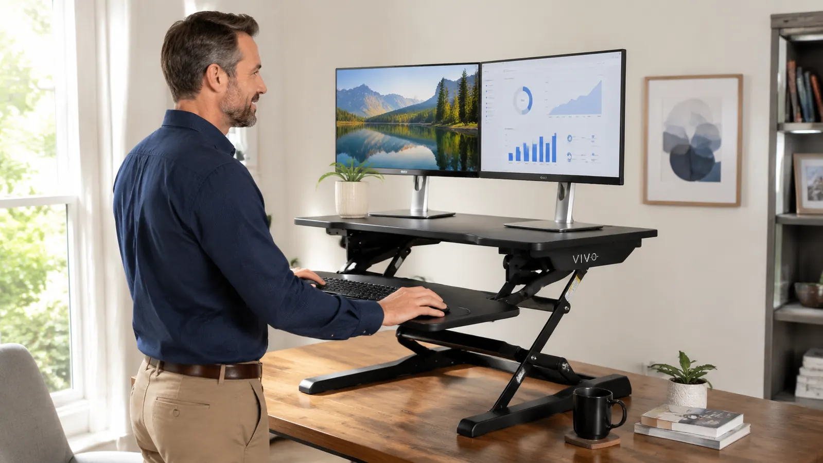 Hands adjusting the gas-spring lift mechanism on a VIVO desk converter platform
