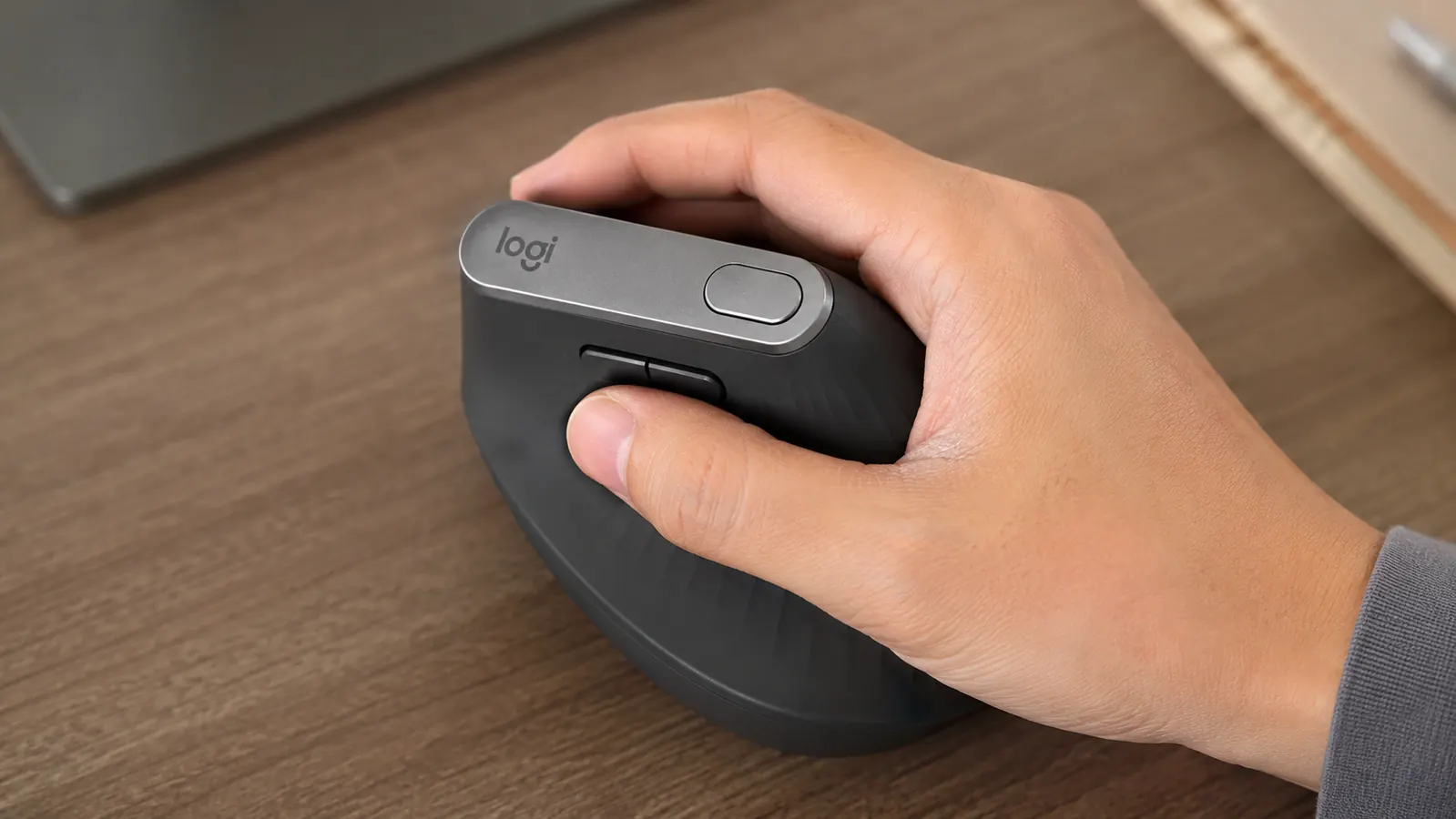 Logitech Options software interface on a laptop screen showing button remapping for the MX Vertical