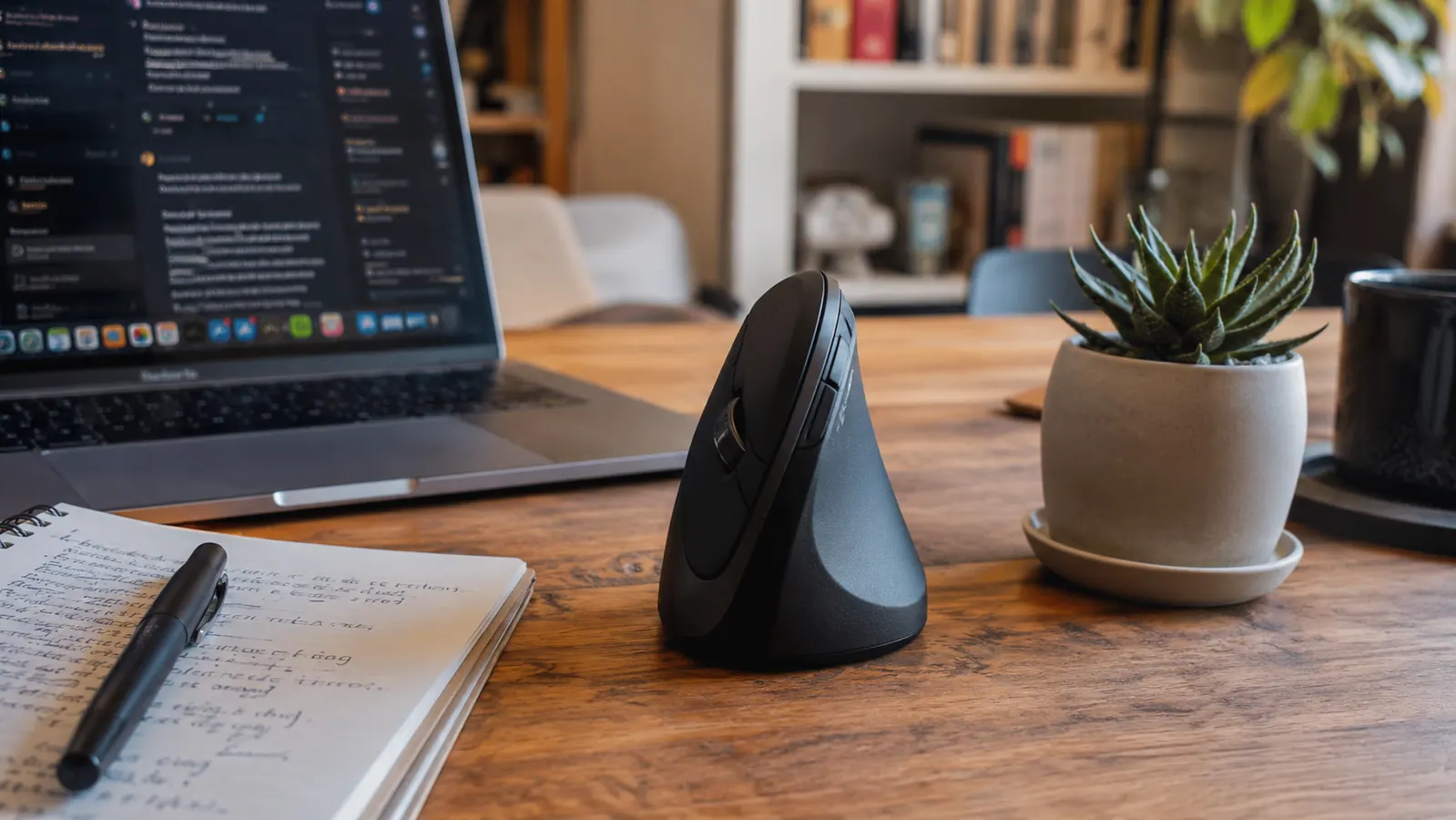Remote worker at a tidy home office desk, relaxed posture, hand resting on a vertical mouse